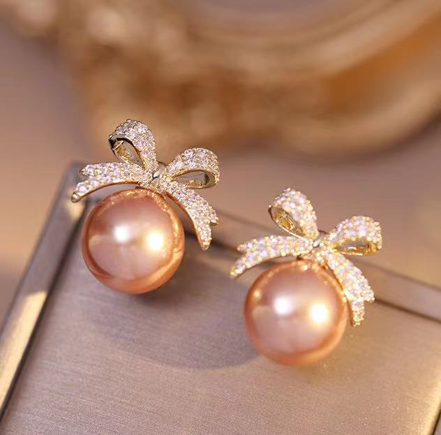 Pendientes de perlas con nudo de lazo Pendientes colgantes de perlas para niñas Pendientes de pajarita de cristal con pin plateado