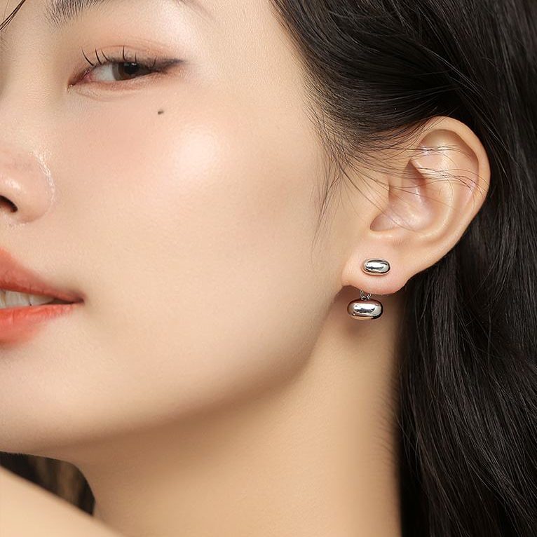 Chaquetas con pendientes de frijol dorado y plateado Pendientes colgantes delanteros y traseros con vibración metálica con pin de plata S925