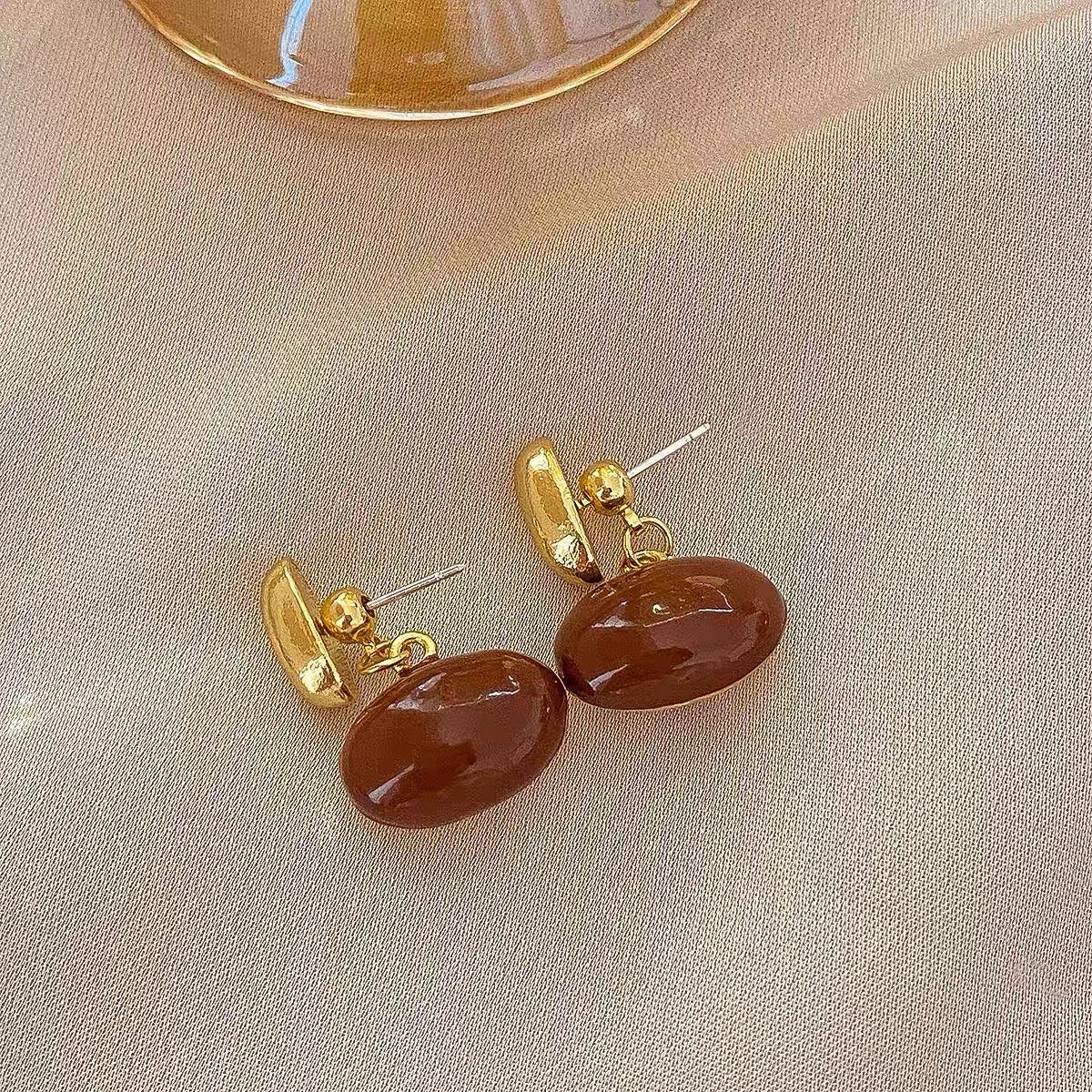 Chaquetas con pendientes de frijol dorado y plateado Pendientes colgantes delanteros y traseros con vibración metálica con pin de plata S925