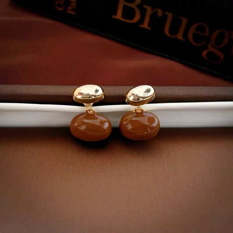 Chaquetas con pendientes de frijol dorado y plateado Pendientes colgantes delanteros y traseros con vibración metálica con pin de plata S925