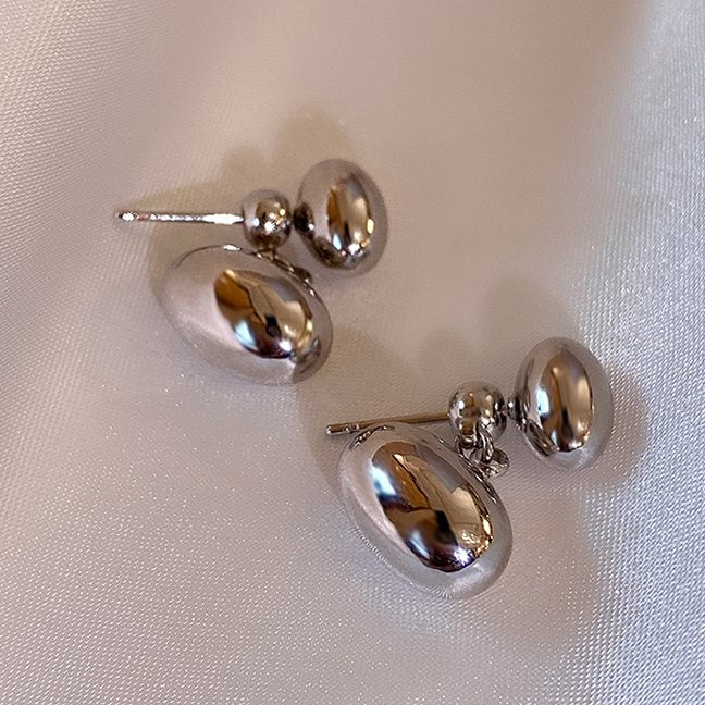 Chaquetas con pendientes de frijol dorado y plateado Pendientes colgantes delanteros y traseros con vibración metálica con pin de plata S925