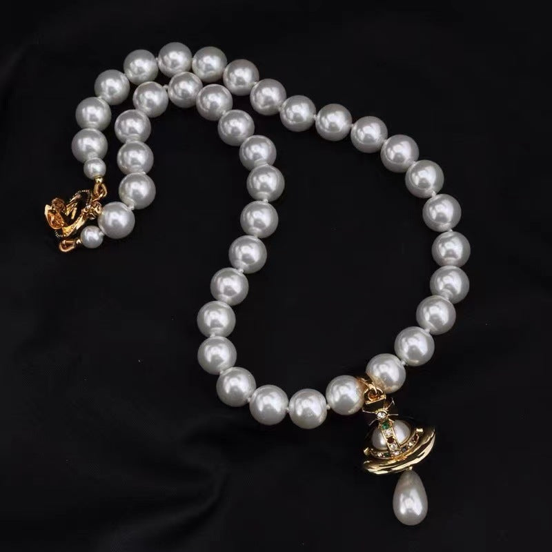 Shell Pearl Necklace with Saturn Pendant Pearl Drop Gold And Silver Avaliable