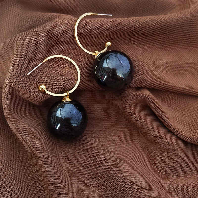 big pearl earrings black