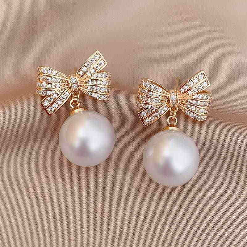 bowknot_pearl_christmas_earrings