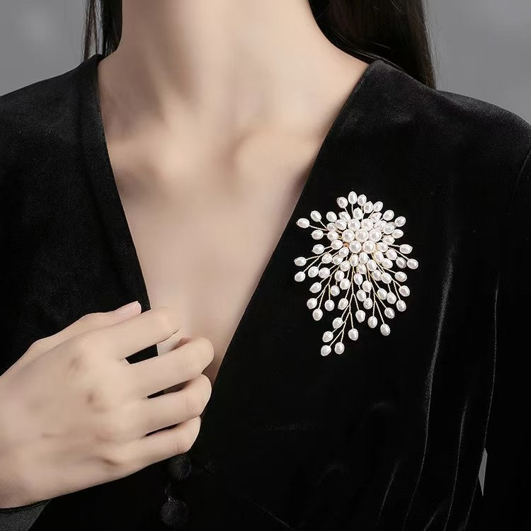 large pearl brooch firework design