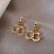 Boucles d'oreilles pendantes Double C | Boucles d'oreilles en or et argent avec diamants et épingle en argent S925