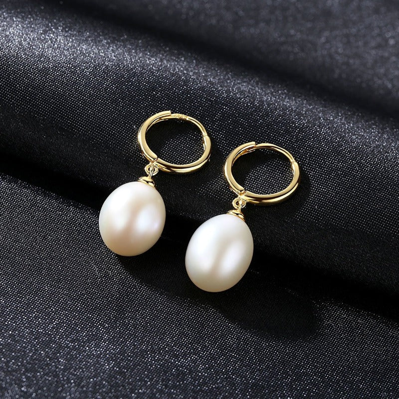 real pearl earrings | gold pearl drop earrings | pearl huggie earrings