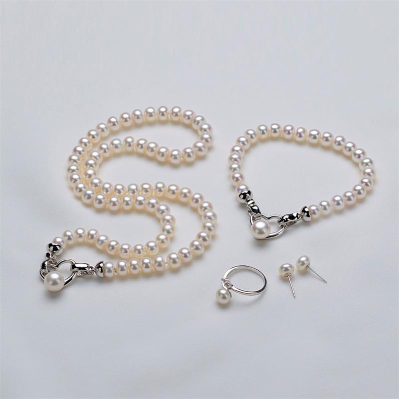 Ensemble de 4 | Collier, bracelet, boucles d'oreilles et bague en perles d'eau douce blanches délicates de 9 à 10 mm