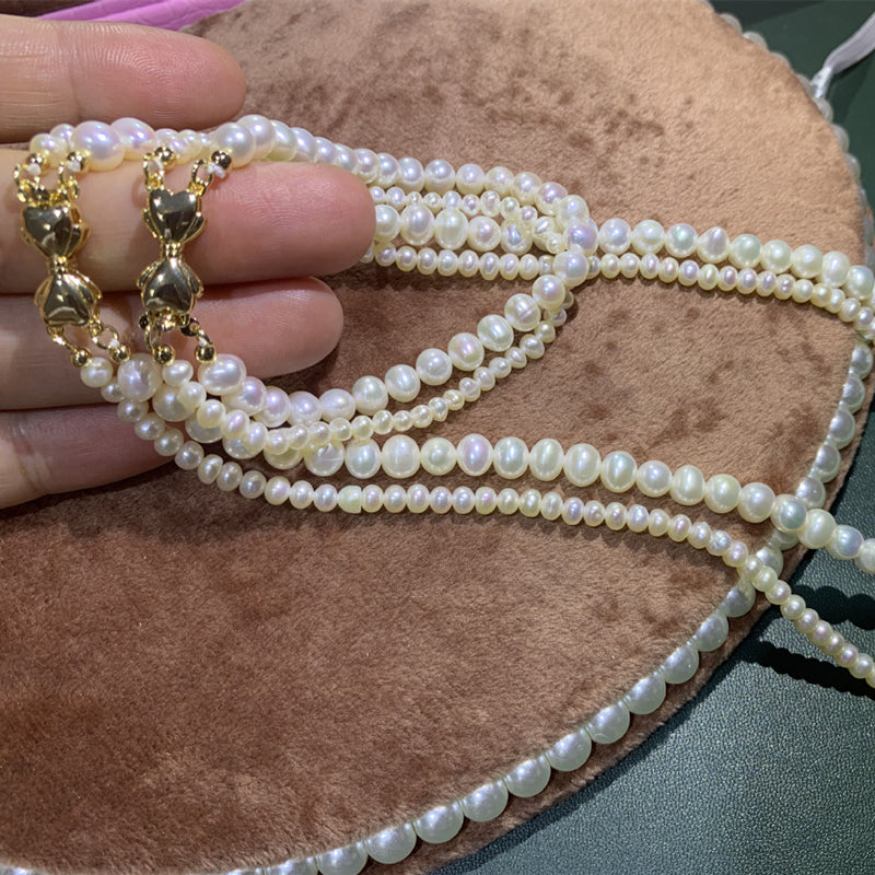 Double Strand Cultured Freshwater Pearl Necklace And Pearl Bracelet with Gold Setting Jewellery Set