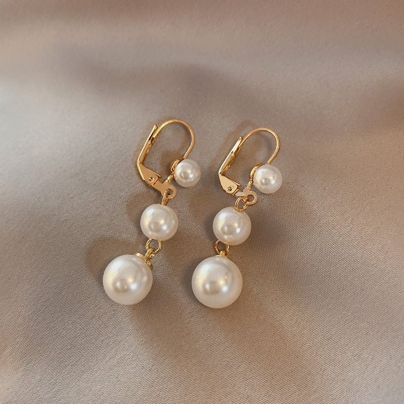 long dangle pearl earrings