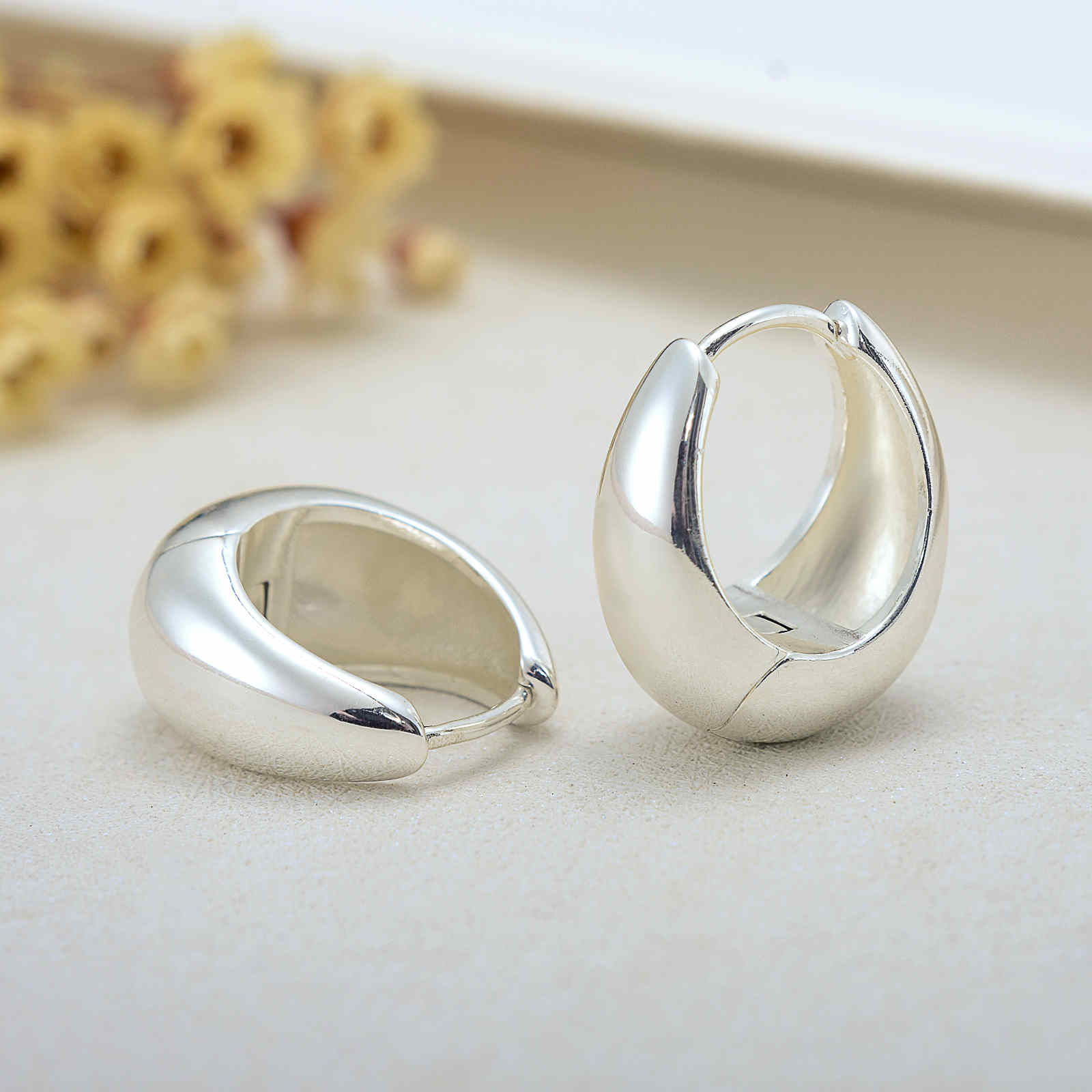 Chunky Hoop Earrings in 18K Gold Plated and Silver | Teardrop Gold Huggie Earrings and Sliver Huggie Earrings