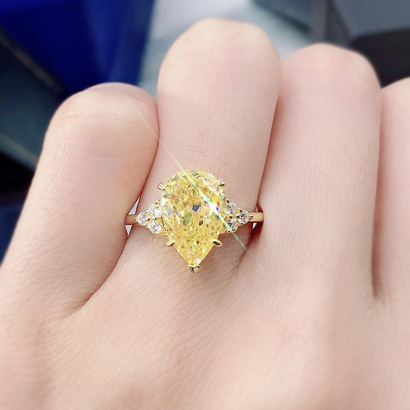 Pear Cut Three-Stone Yellow Lab Grown Diamond Engagement Ring 4.5 CTW with 14K Gold Over S925 Silver GH/VVS