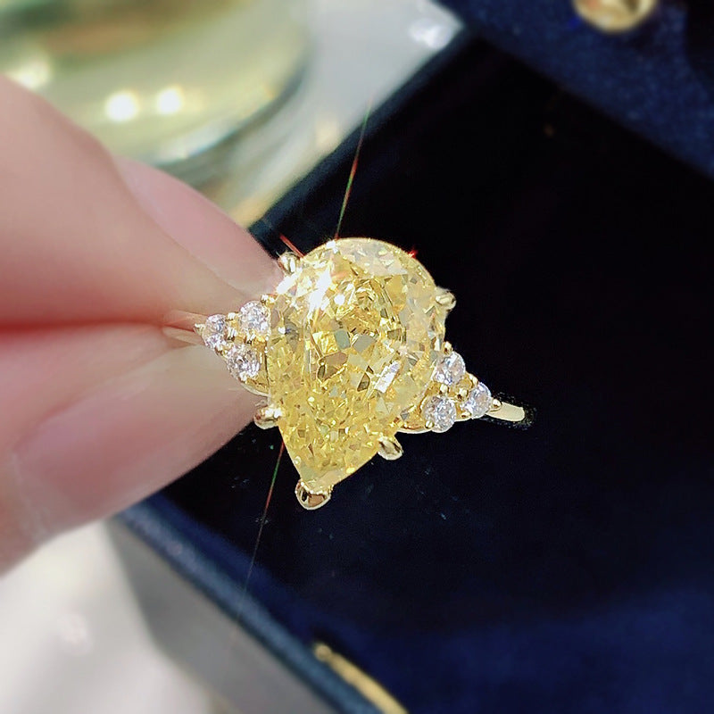 Pear Cut Three-Stone Yellow Lab Grown Diamond Engagement Ring 4.5 CTW with 14K Gold Over S925 Silver GH/VVS