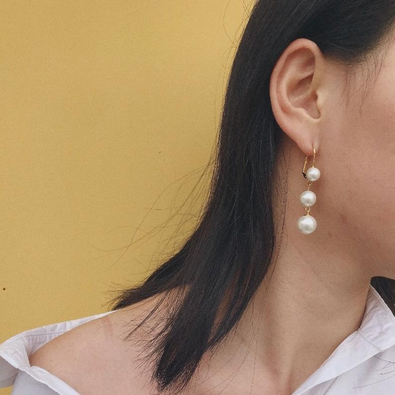 white pearl dangle earrings