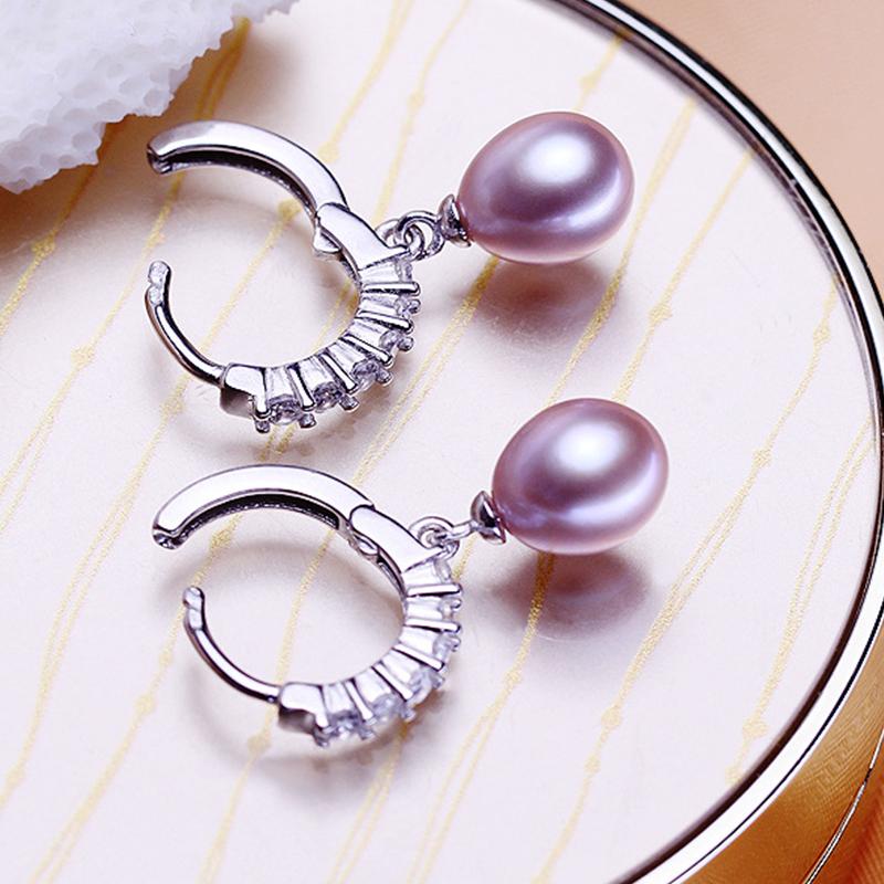 Purple pearl huggie earrings