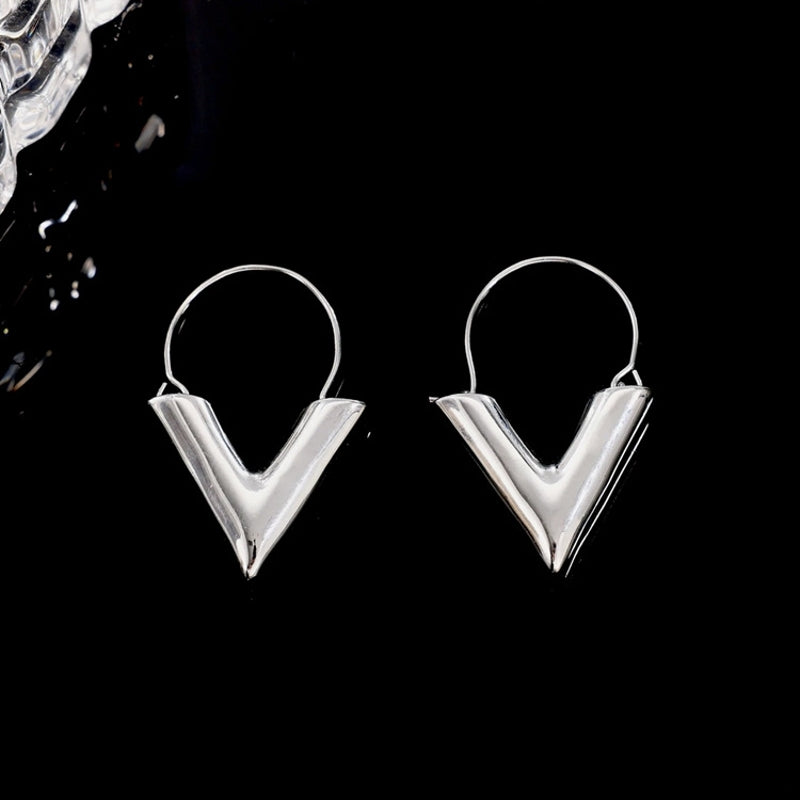 Silver 3D Yeah Triangle Huggie Earrings